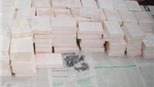 Lào Cai bắt đầu xử vụ mua bán hơn 60 bánh heroin