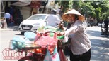 Chùm ảnh: Người Hà Nội vật vã dưới nắng nóng gần 40 độ C