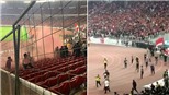 CĐV Việt Nam chú ý: Ẩu đả kinh hoàng trận Indonesia vs Malaysia, cầu thủ rời sân bằng xe bọc thép